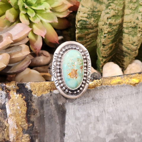 Royston Turquoise Oval Ring is perfect for adding a touch of elegance to any outfit. The Royston turquoise stone is known for its unique blend of green and brown colors, making each ring one-of-a-kind. The oval shape adds a classic touch