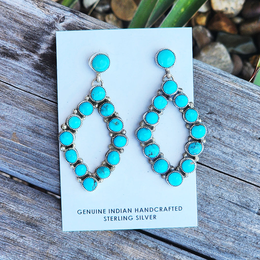 Kingman Turquoise diamond shape dangle post style earrings. 