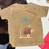 tan tee/Onesie features a bull breaking a surf board