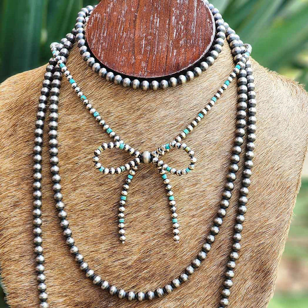 Navajo pearl and turquoise bow necklace 