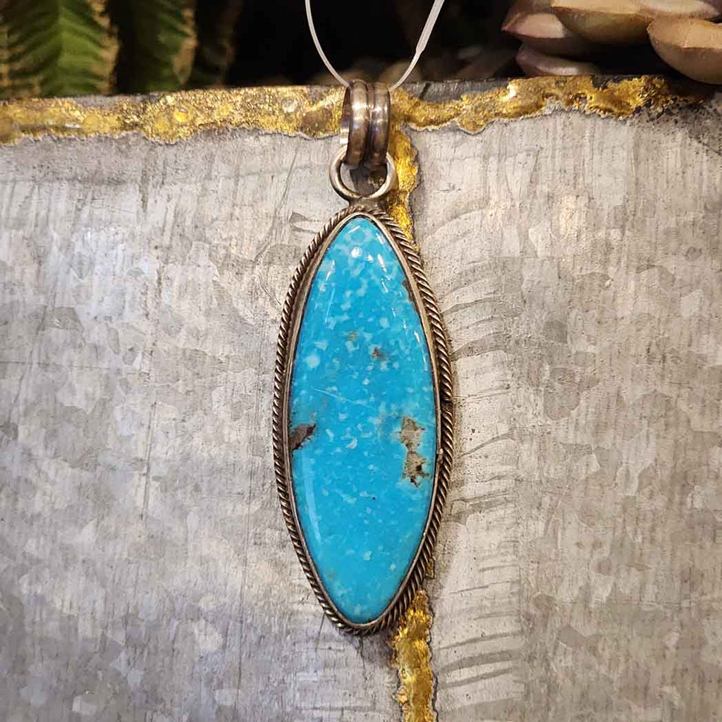 Oval shaped Blue ridge turquoise pendant 2 inches 