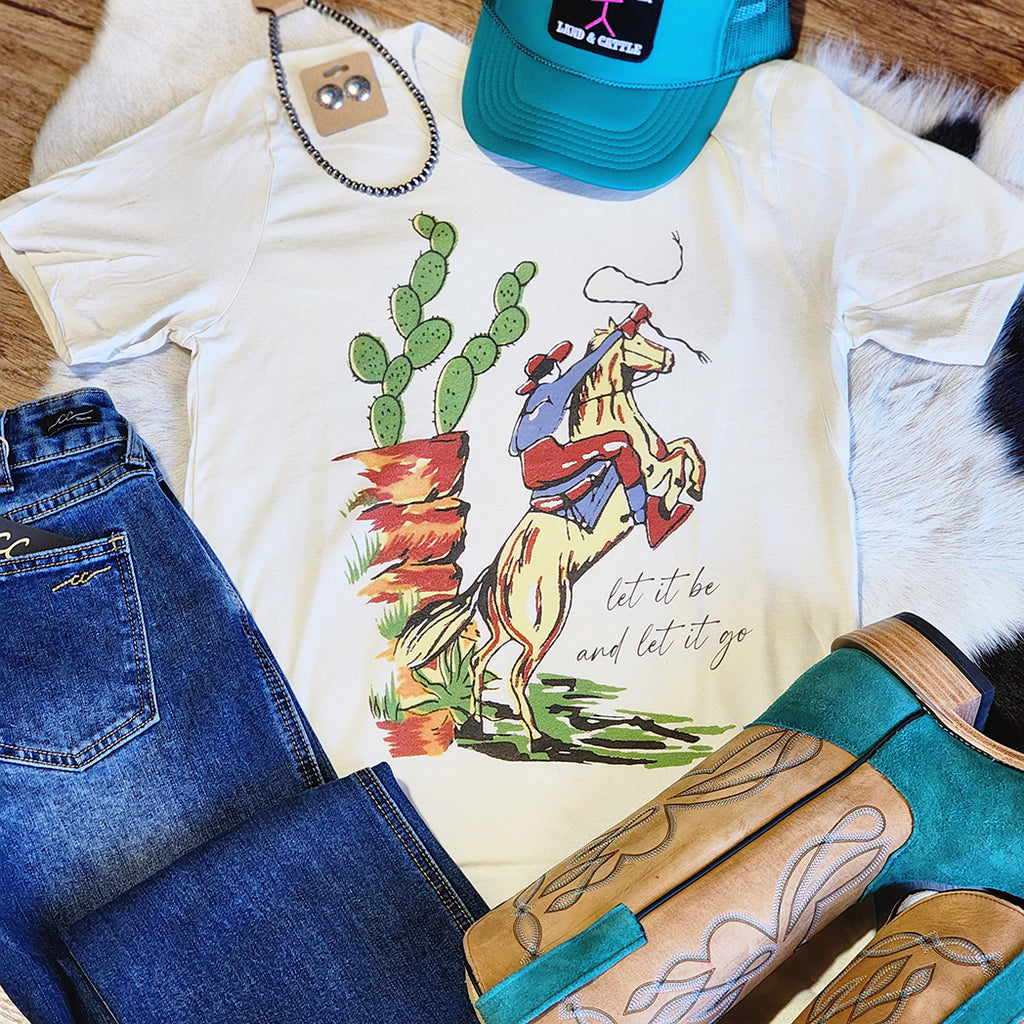 cream colored tee with a Mexican touch with Vaquero on his horse and fun " Let it be and let it go " Saying 