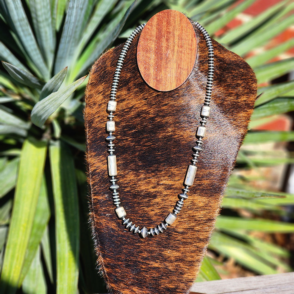 Sterling silver statement necklace with discs and bench beads.  24 inches in length