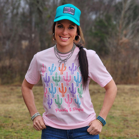 pink tee with colorful cactus and the wording Prickly & Perfect 