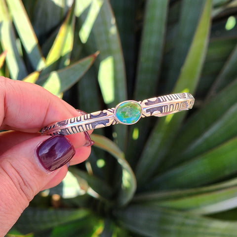 Sterling Silver cuff with designs and 1 Sonoran Gold Turquoise stone