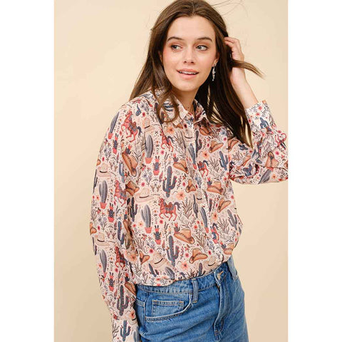 This western print blouse is Chiffon material and is a bit sheer. Button up front. 