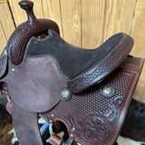 View of the gold accent conchos and basket weave with desert flower corners 