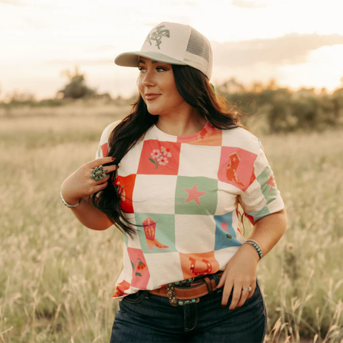 Western tee with different square boxes with boots, flowers and western designs 